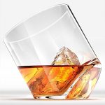 leaning whisky glass